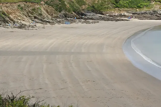 Porthcurnick beach on the Roseland, home of the Hidden Hut