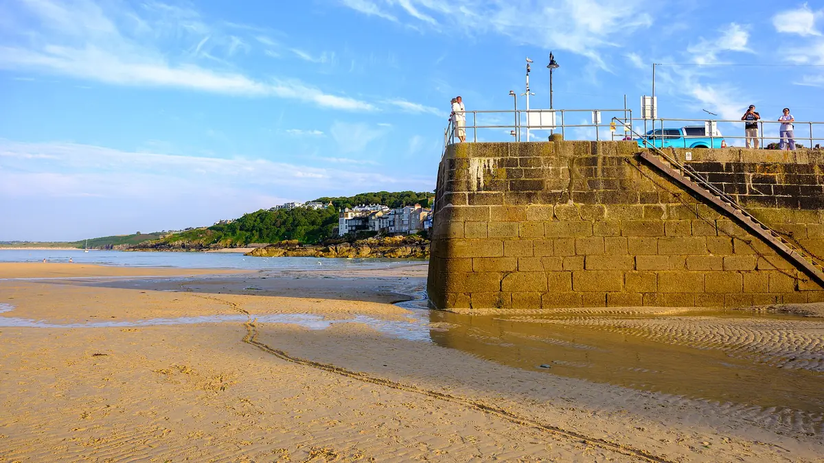 Boats in St Ives harbour at low tide